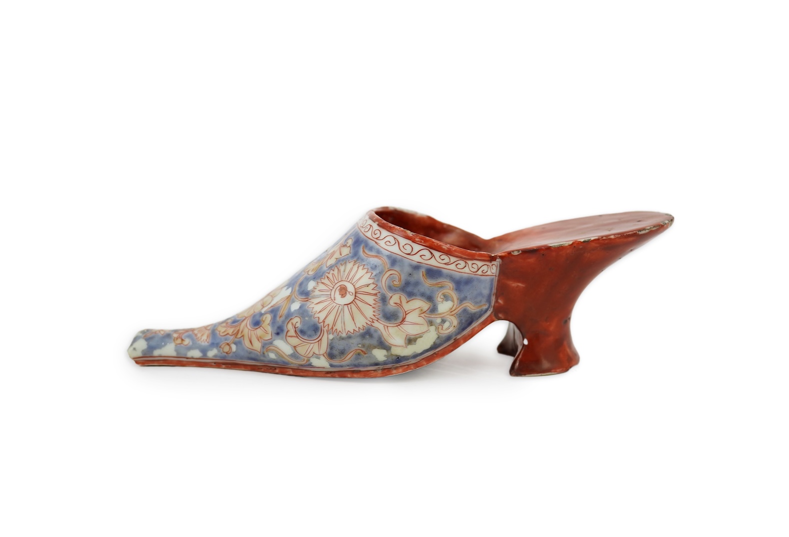 A rare Japanese Arita or Chinese porcelain model of a shoe, based on a Delft shape, first half of 18th century